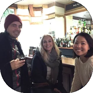 Three friends at a bar